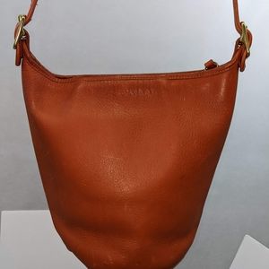 Orange leather bucket purse